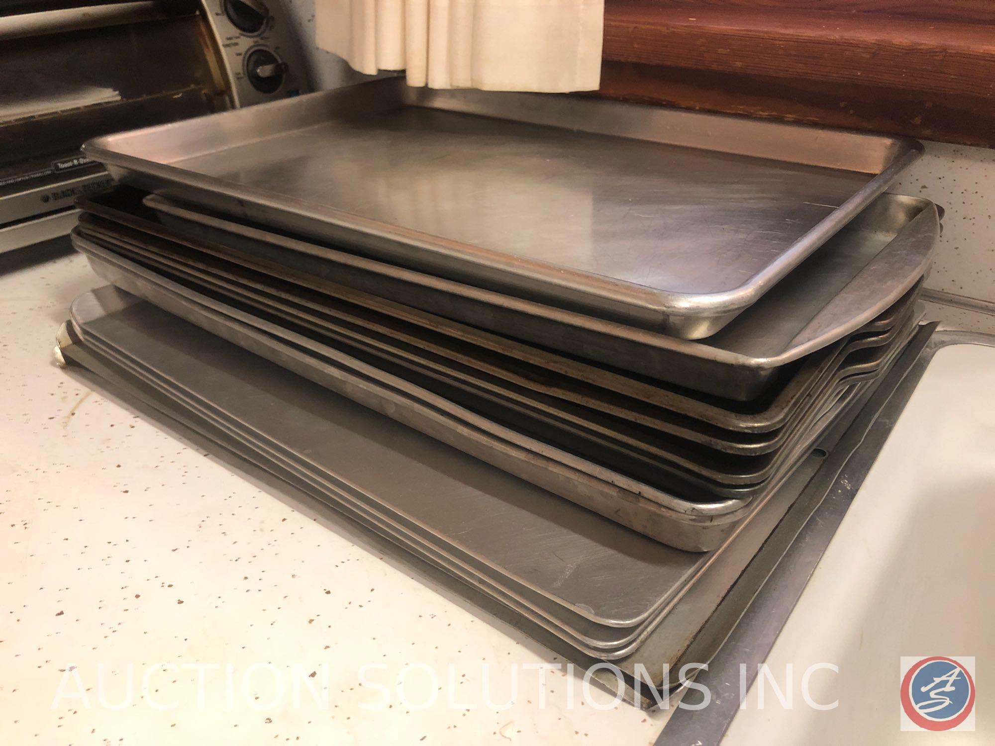 Assorted Glassware, Cookie Sheets, Black and Decker Toaster Oven and Spacemaker Can Opener