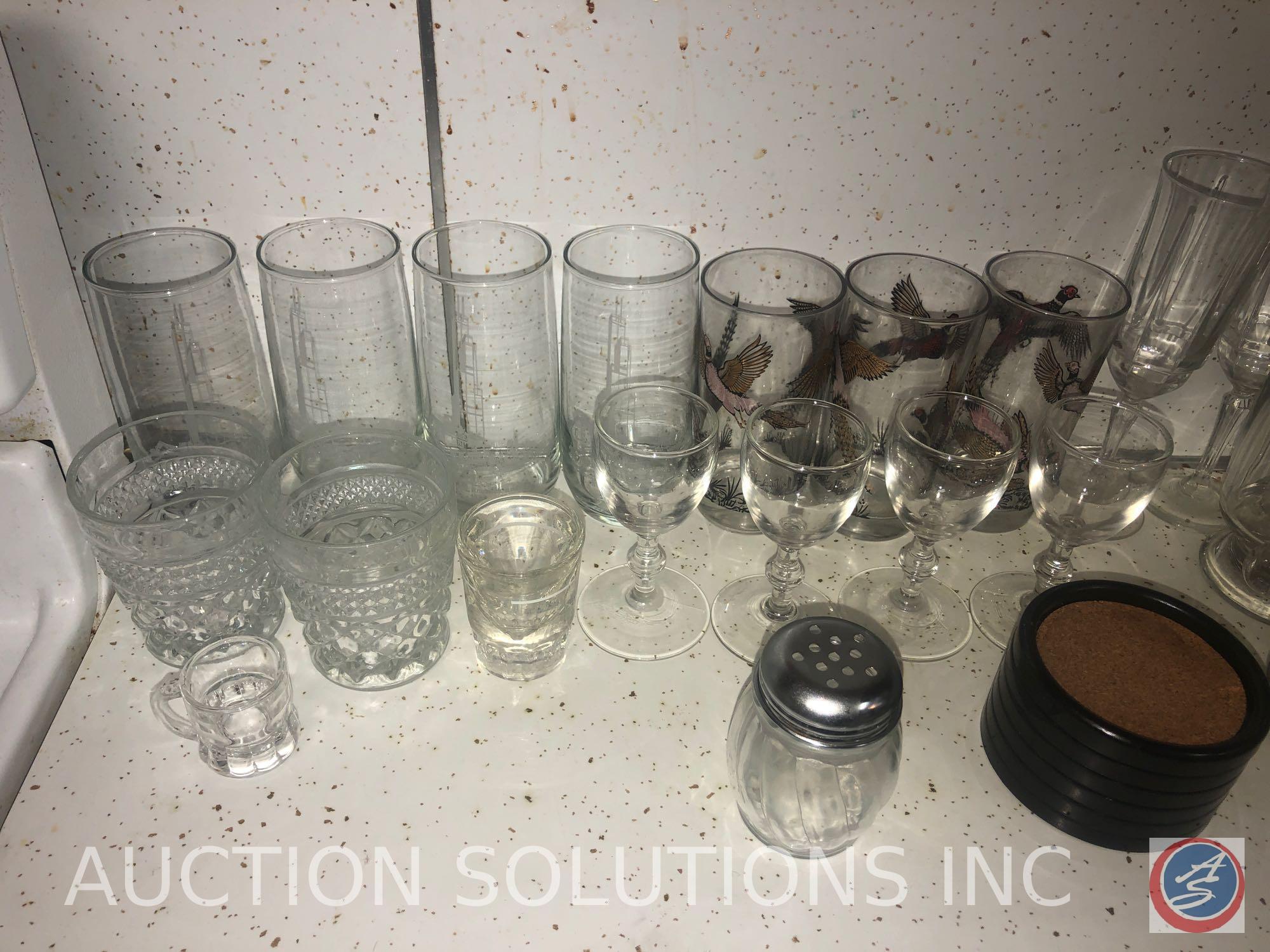 Assorted Glassware, Cookie Sheets, Black and Decker Toaster Oven and Spacemaker Can Opener