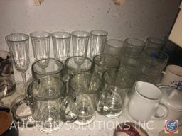 Assorted Glassware, Cookie Sheets, Black and Decker Toaster Oven and Spacemaker Can Opener