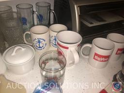 Assorted Glassware, Cookie Sheets, Black and Decker Toaster Oven and Spacemaker Can Opener