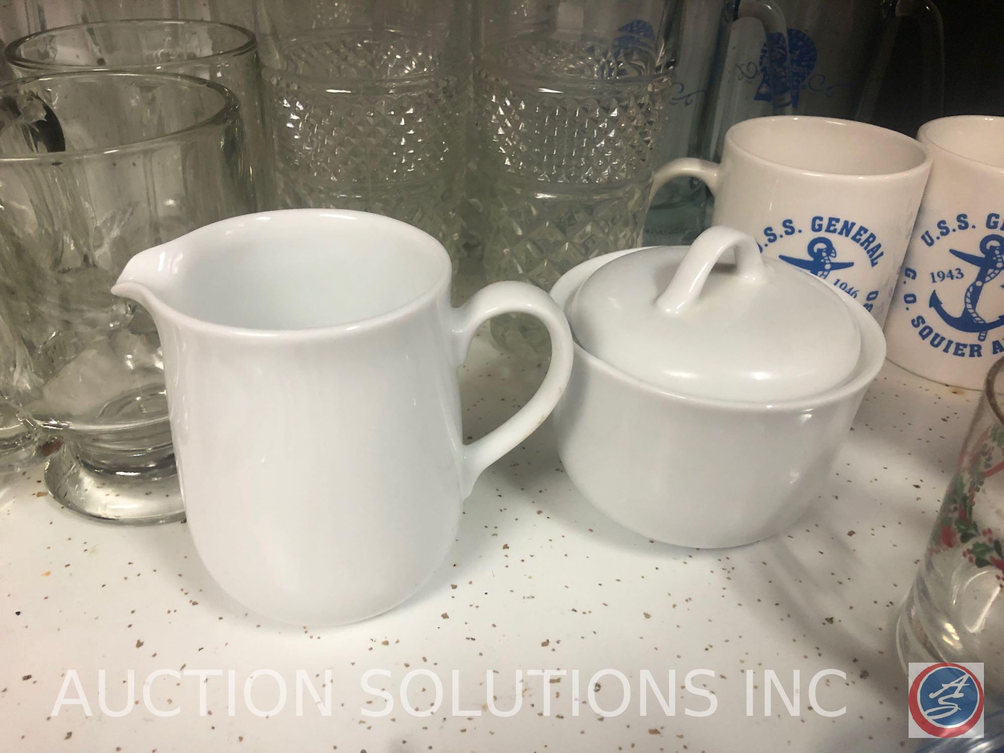 Assorted Glassware, Cookie Sheets, Black and Decker Toaster Oven and Spacemaker Can Opener