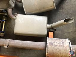 Assorted Mufflers with Exhaust Pipes Attached,