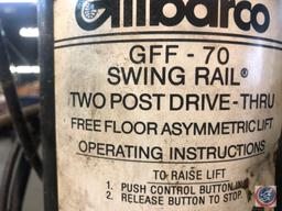 Automotive Lift Institute, Inc. Lift with Gilbarco Swing Rail Two-Post Drive-Thru Model GFF-70
