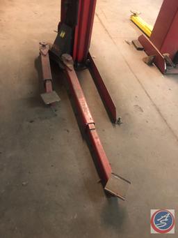 Automotive Lift Institute, Inc. Lift with Gilbarco Swing Rail Two-Post Drive-Thru Model GFF-70