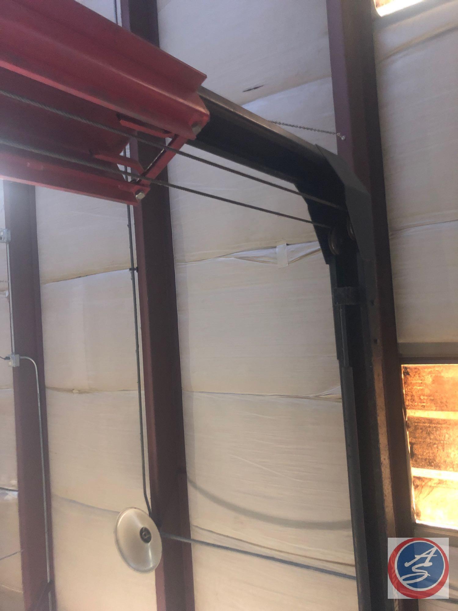 Automotive Lift Institute, Inc. Lift with Gilbarco Swing Rail Two-Post Drive-Thru Model GFF-70