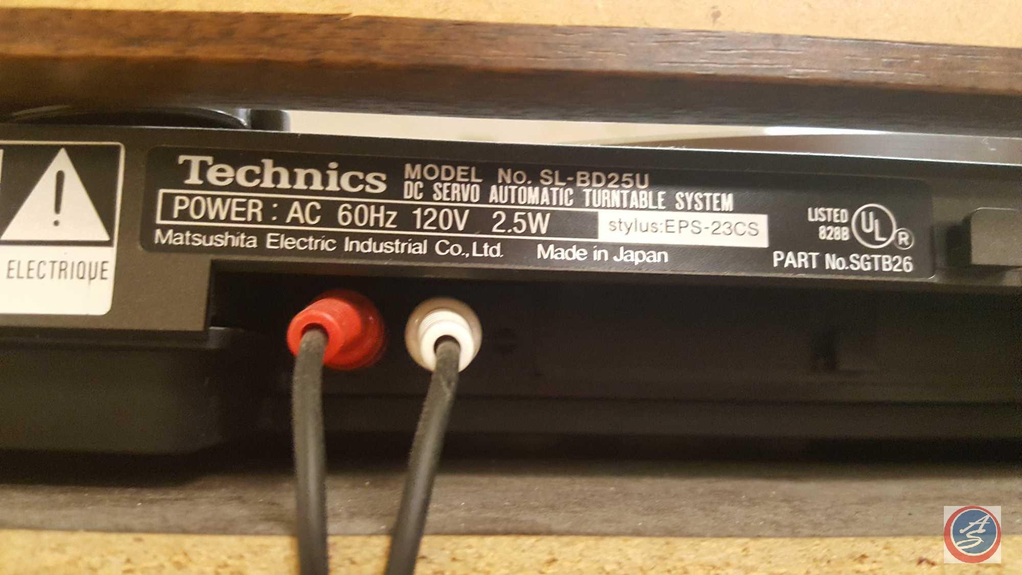 Retro Technics Stereo System in Cabinet Including: Model SU-V75 Stereo Integrated Amplifier,