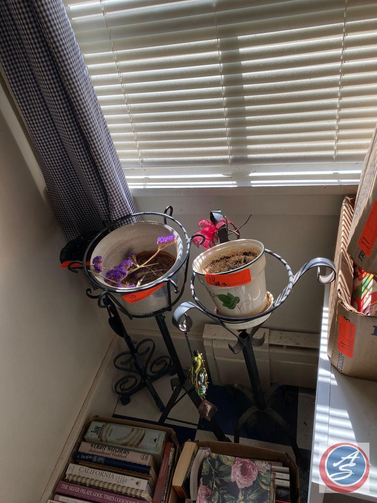 3 cast iron plant stands, with pots