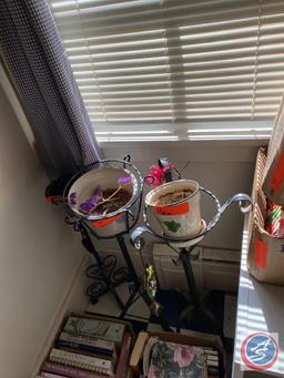 3 cast iron plant stands, with pots