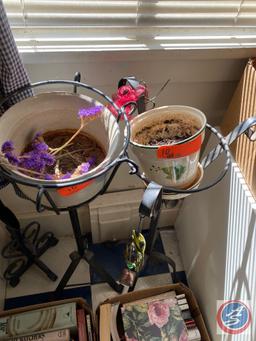 3 cast iron plant stands, with pots