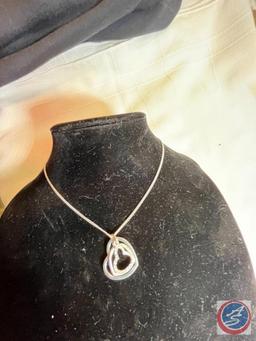 Necklace and earrings with matching pendant