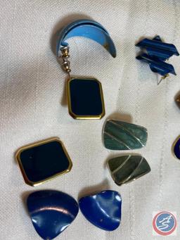 Necklace and earrings with matching pendant