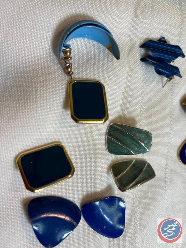Necklace and earrings with matching pendant