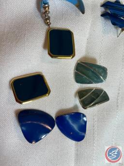 Necklace and earrings with matching pendant