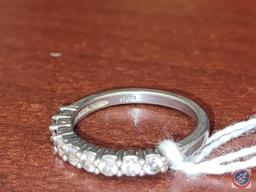 9 Stones set in .925 silver size 7.5