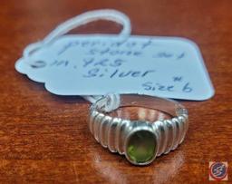 Peridot stone...set in .925 silver size 6