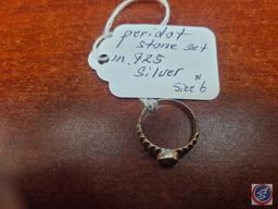 Peridot stone...set in .925 silver size 6
