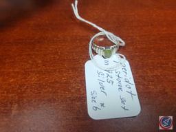Peridot stone...set in .925 silver size 6