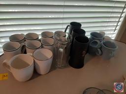 Assorted coffee cups A&W root beer mug.