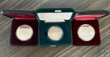 (3) Canadian silver dollars: 1987 Canada dollar, 1984 Jacques Cartier, 1587-1987 Canada dollar
