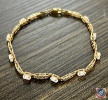 Gold and opal bracelet (opal's unverified)
