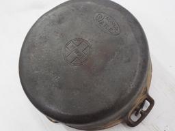 Cast iron flat bottom kettle marked