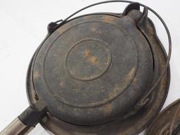 (2) Wagner cast iron waffle irons