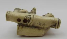 SIGNED CARVED NETSUKE OF TWO SQUIRRELS
