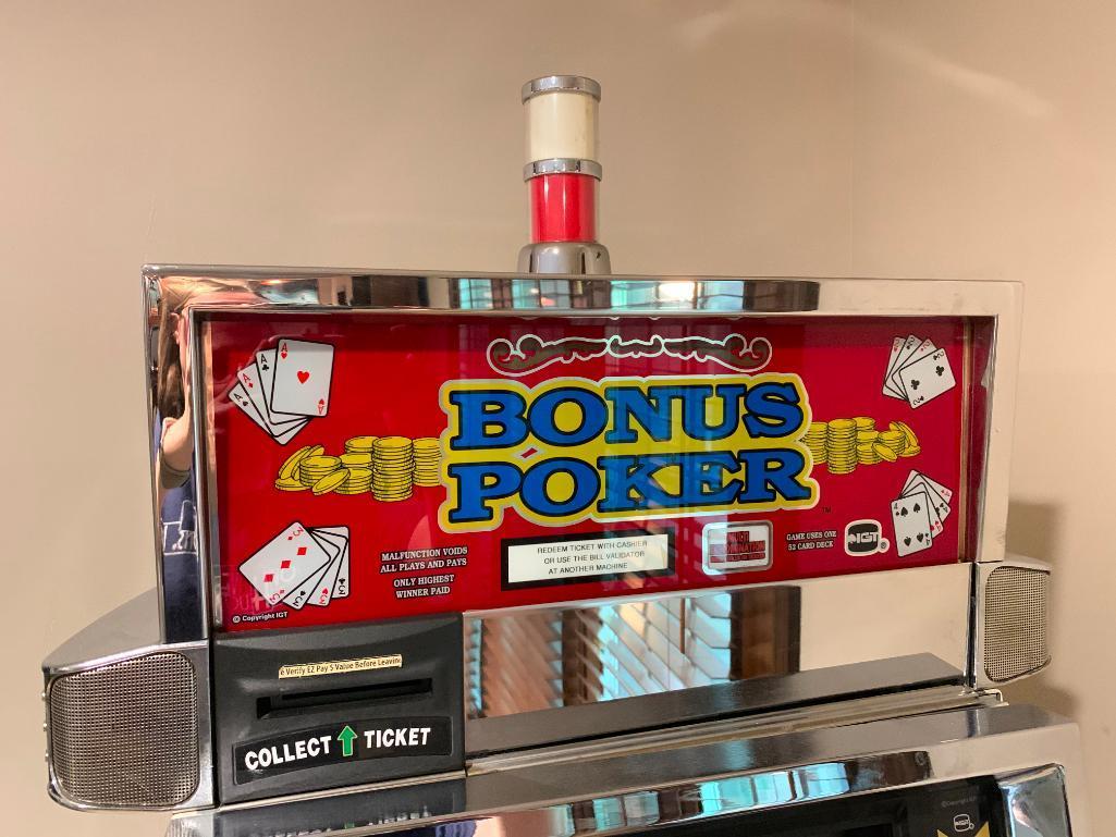 Bonus Poker Slot Machine w/Keys. This is 42" Tall x 24" Wide x 20" Deep - As Pictured