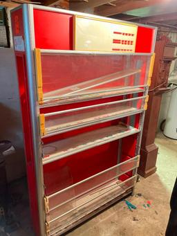 Cigarette Center Cabinet in Basement of House with Walkout to Yard 75 inches Tall and 38 inches wide