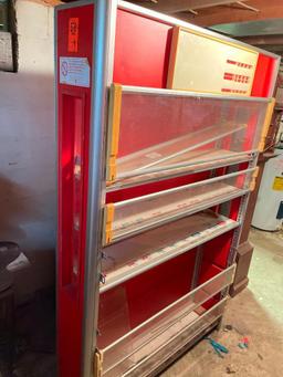 Cigarette Center Cabinet in Basement of House with Walkout to Yard 75 inches Tall and 38 inches wide