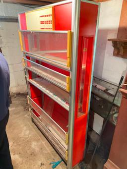 Cigarette Center Cabinet in Basement of House with Walkout to Yard 75 inches Tall and 38 inches wide
