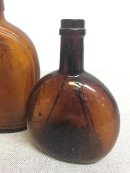 Group of Three Vintage Amber Bottles