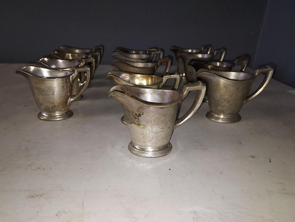 Thirteen Vintage King Cole Soldered Silver Creamers