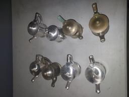 Eight Vintage King Cole International Silver Syrup Pitchers