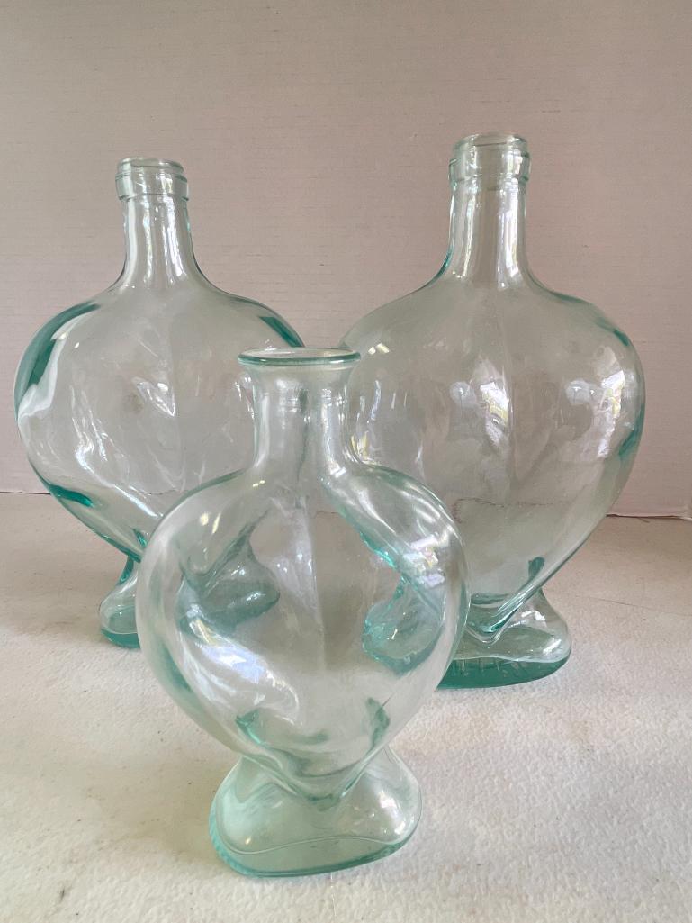 Group of 3 Heat Shaped Glass Bottles