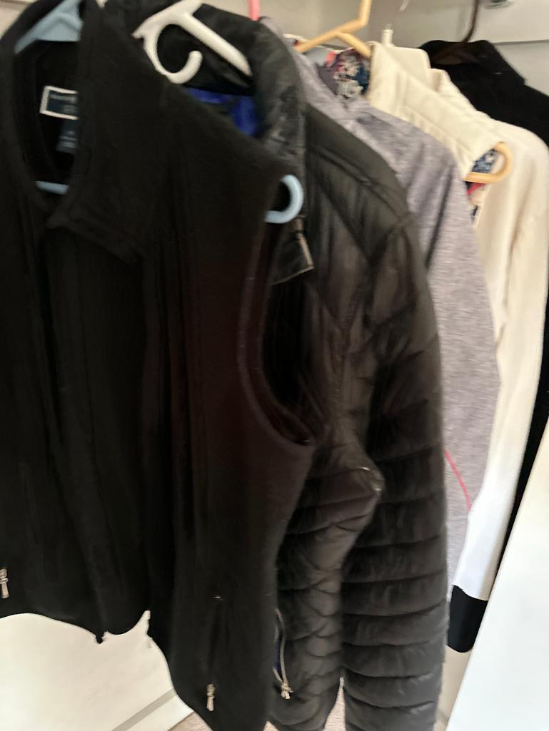 Coats and Jackets in Primary Bedroom Closet