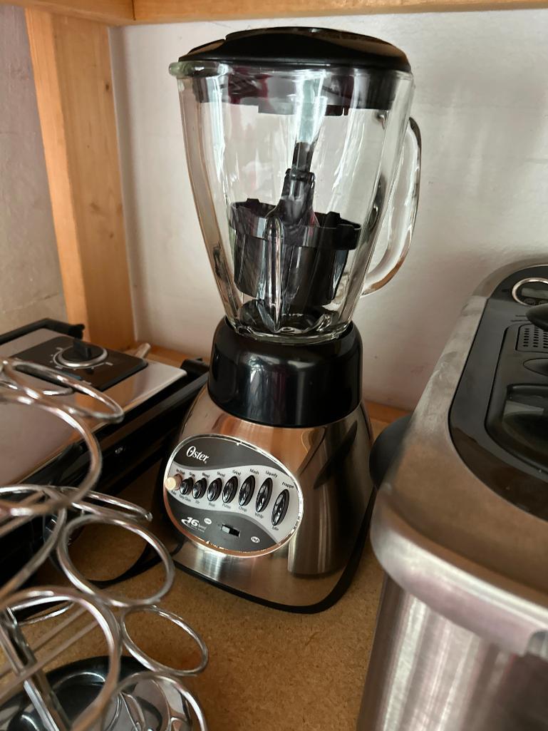 Shelf Lot of Counter Top Kitchen Appliances and Plastic Ware