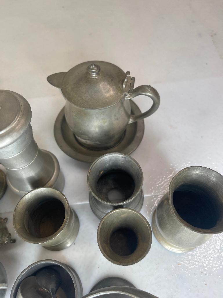 Large assortment of pewter pieces