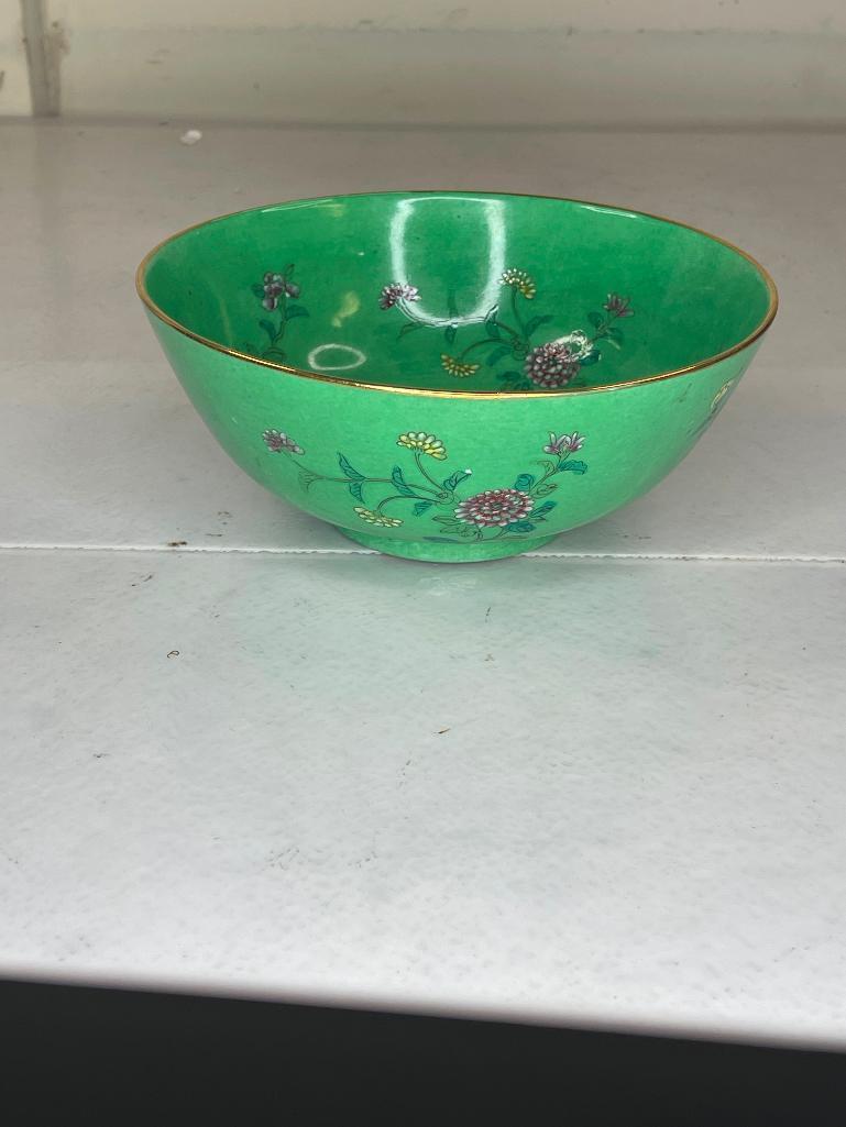 Green bowl with flowers