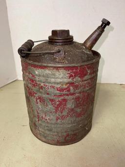 Vintage Oil Can and Brass Duck Bookend