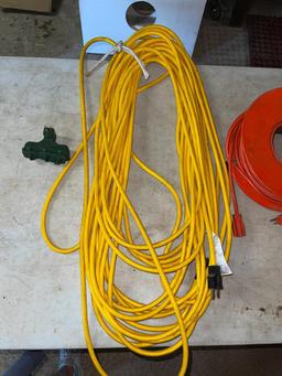 Two 100' Extension Cords and Three Way Plug