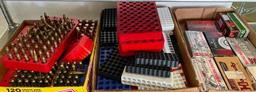 Various Brass Spent Casings and Ammo Holders