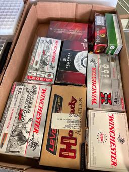 Various Brass Spent Casings and Ammo Holders