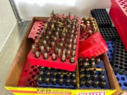 Various Brass Spent Casings and Ammo Holders