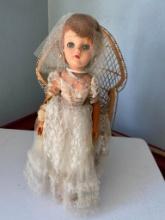 Vintage Doll and Wicker Chair