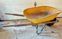 Older Yellow Wheel Barrow