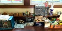 Large Lot of Nuts, Bolts, Screws, Nails and More on Garage Workbench