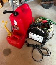 A 6 Gallon Gas Can, 1 Gallon Gas Can, Jumper Cables and Battery Charger Working!