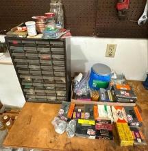 Large Lot of Nuts, Bolts and Screws on Workbench and in Two Sets of Drawers