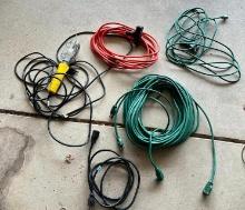 Group of Five Heavier Duty Extension Cords and a Drop Light